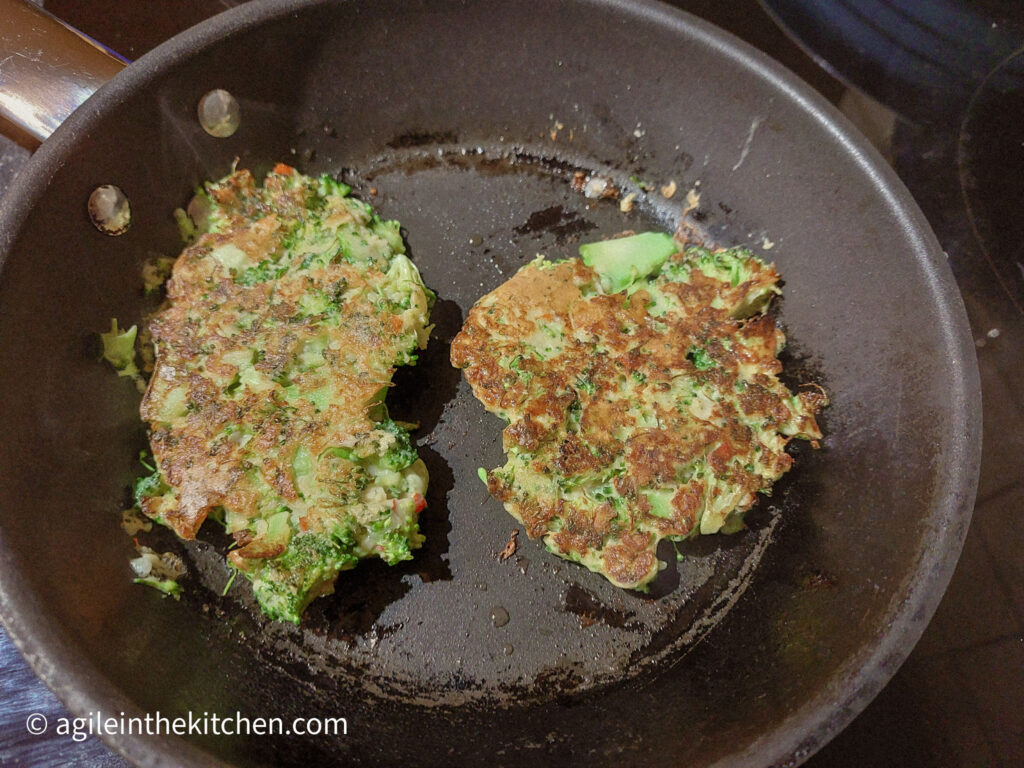 In a frying pan two broccoli pancakes